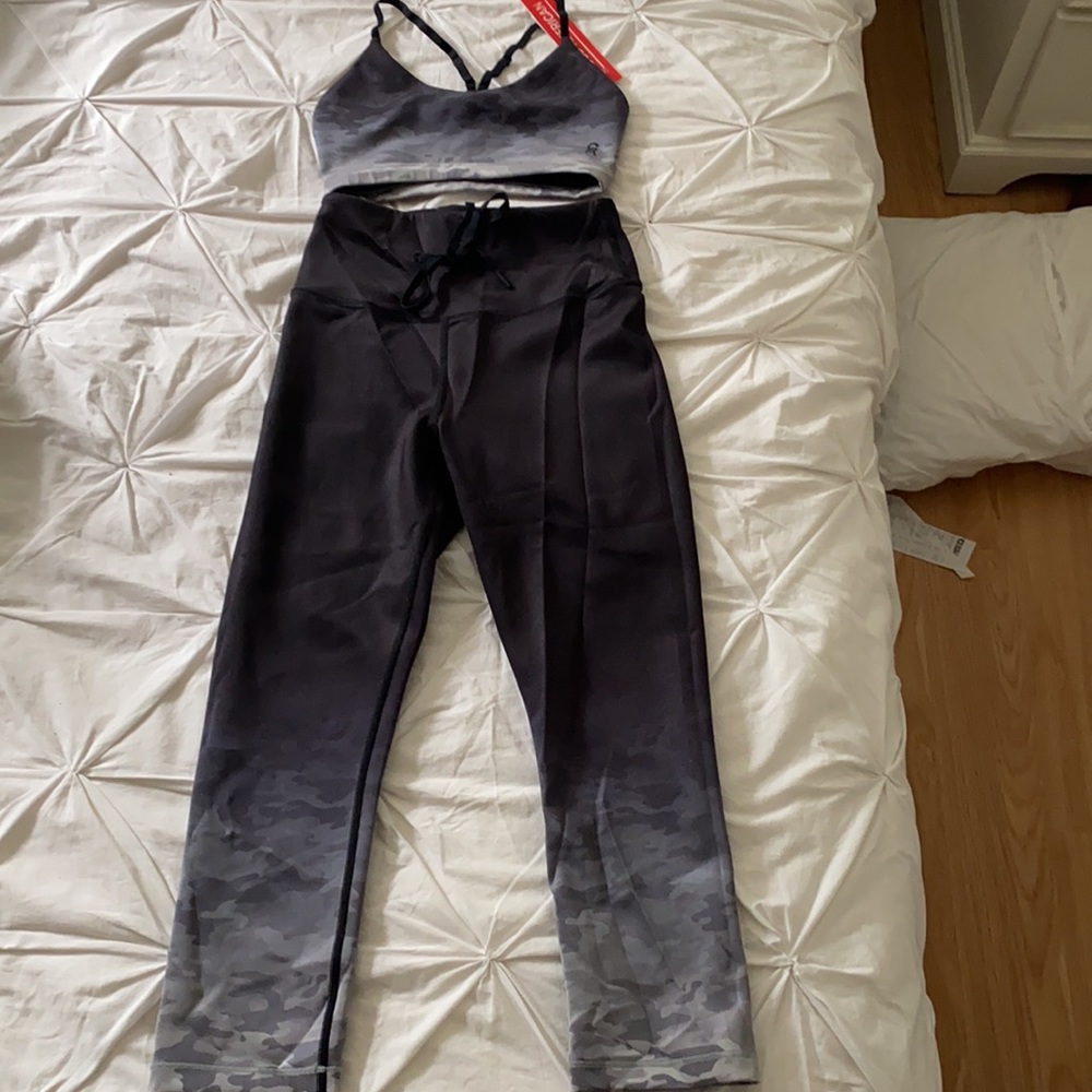 Good American grey sports bra and leggings